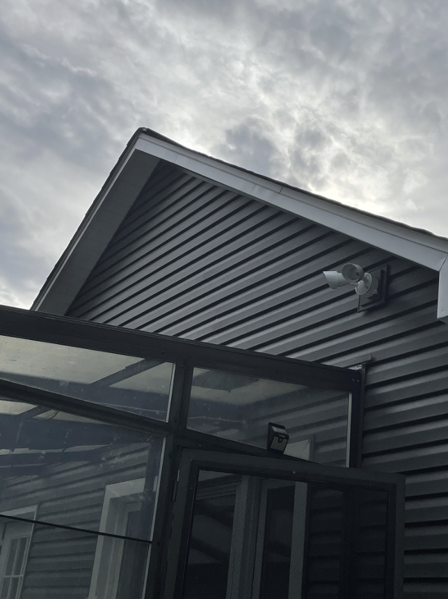 Restored home exterior with new siding