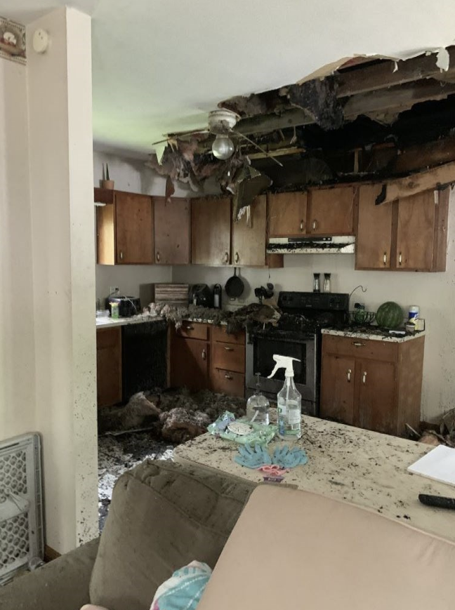 Interior hallway with fire debris